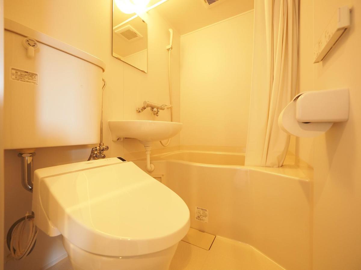 Family Tree Guest House Sapporo Bagian luar foto